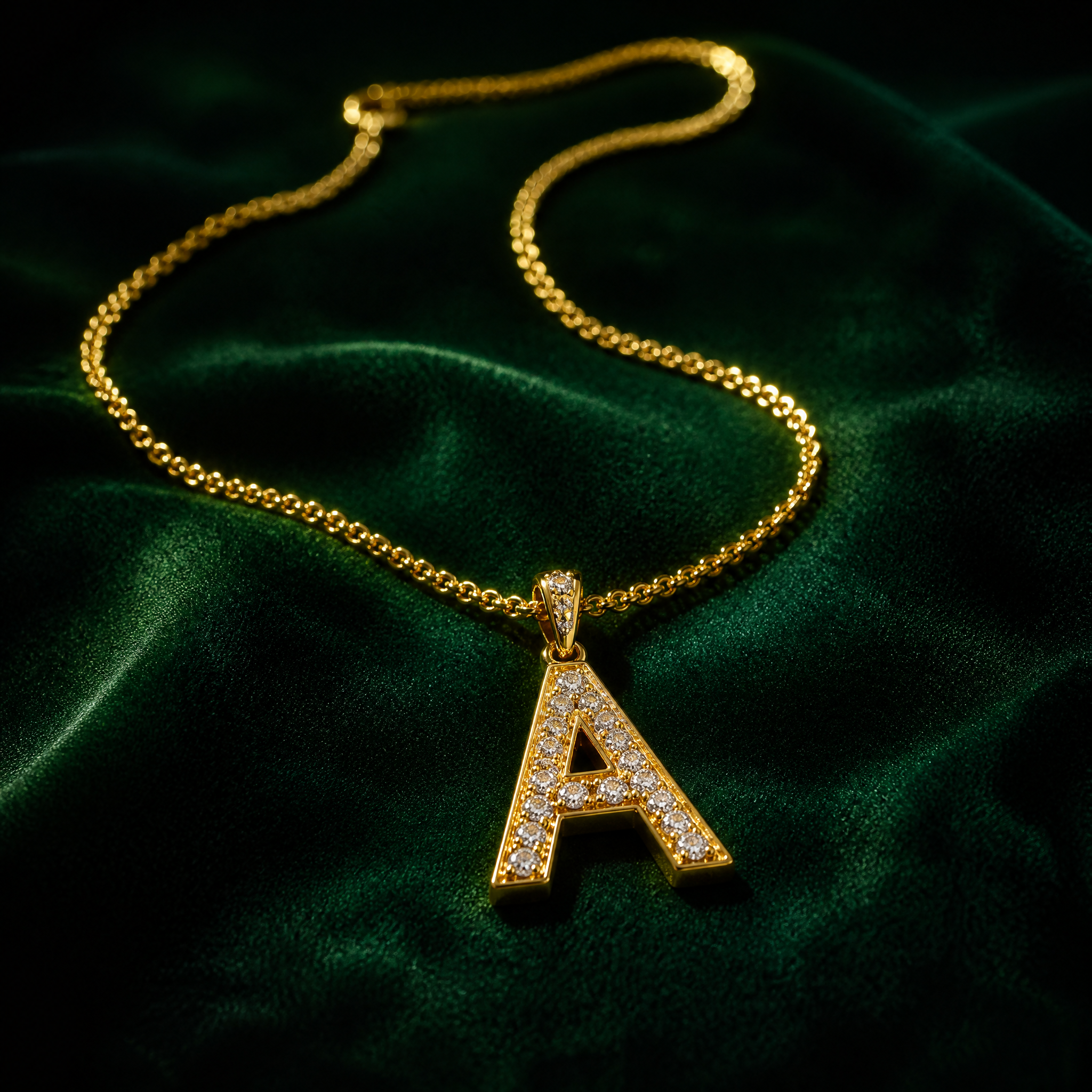 18K gold initial diamond pendant necklace on emerald velvet