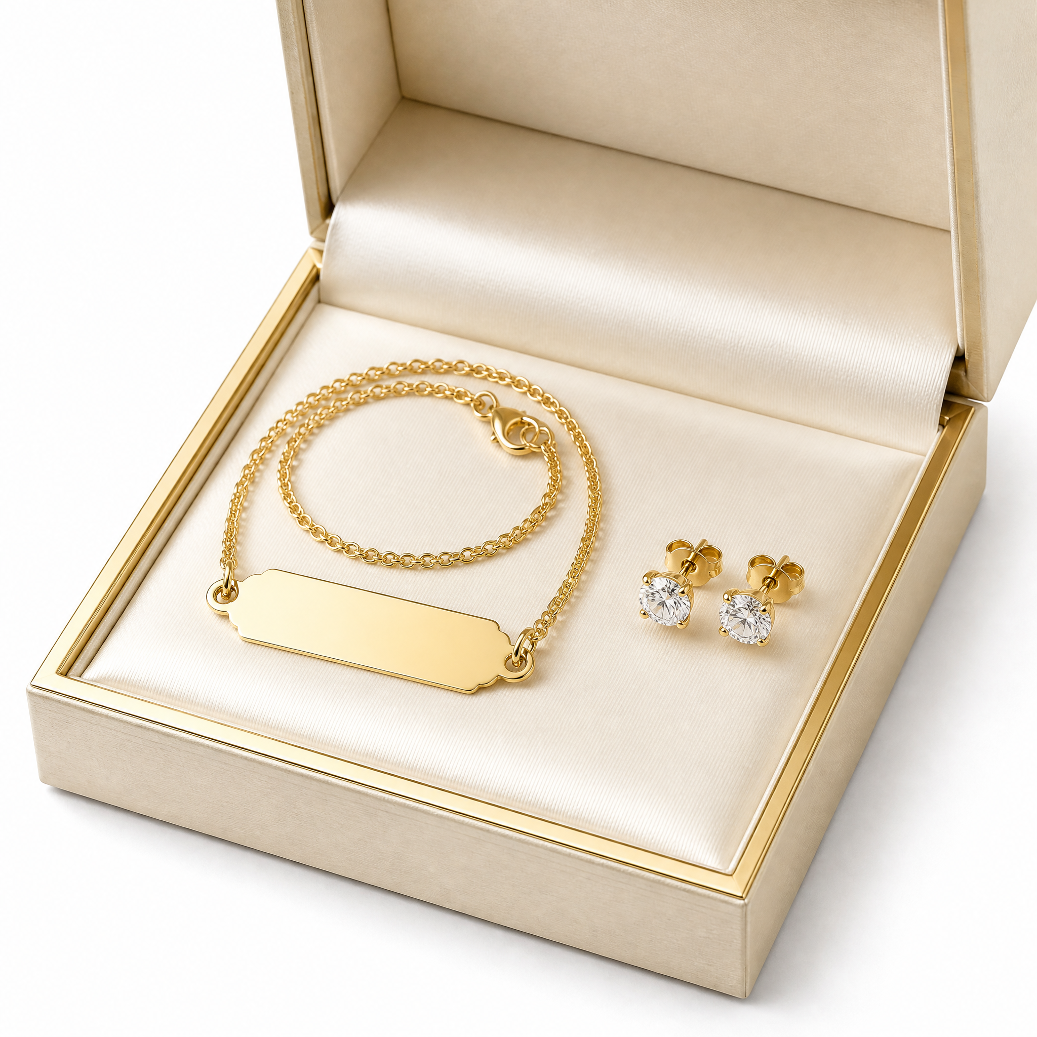 18K gold name necklace and diamond studs gift set on white background