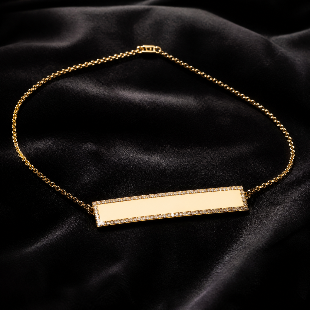 18K gold engravable diamond bar necklace on charcoal velvet