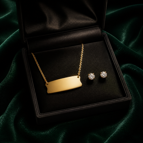18K gold name necklace and diamond studs gift set on emerald velvet